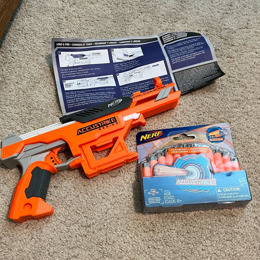 NERF GUN w/ nerf “darts” and manual